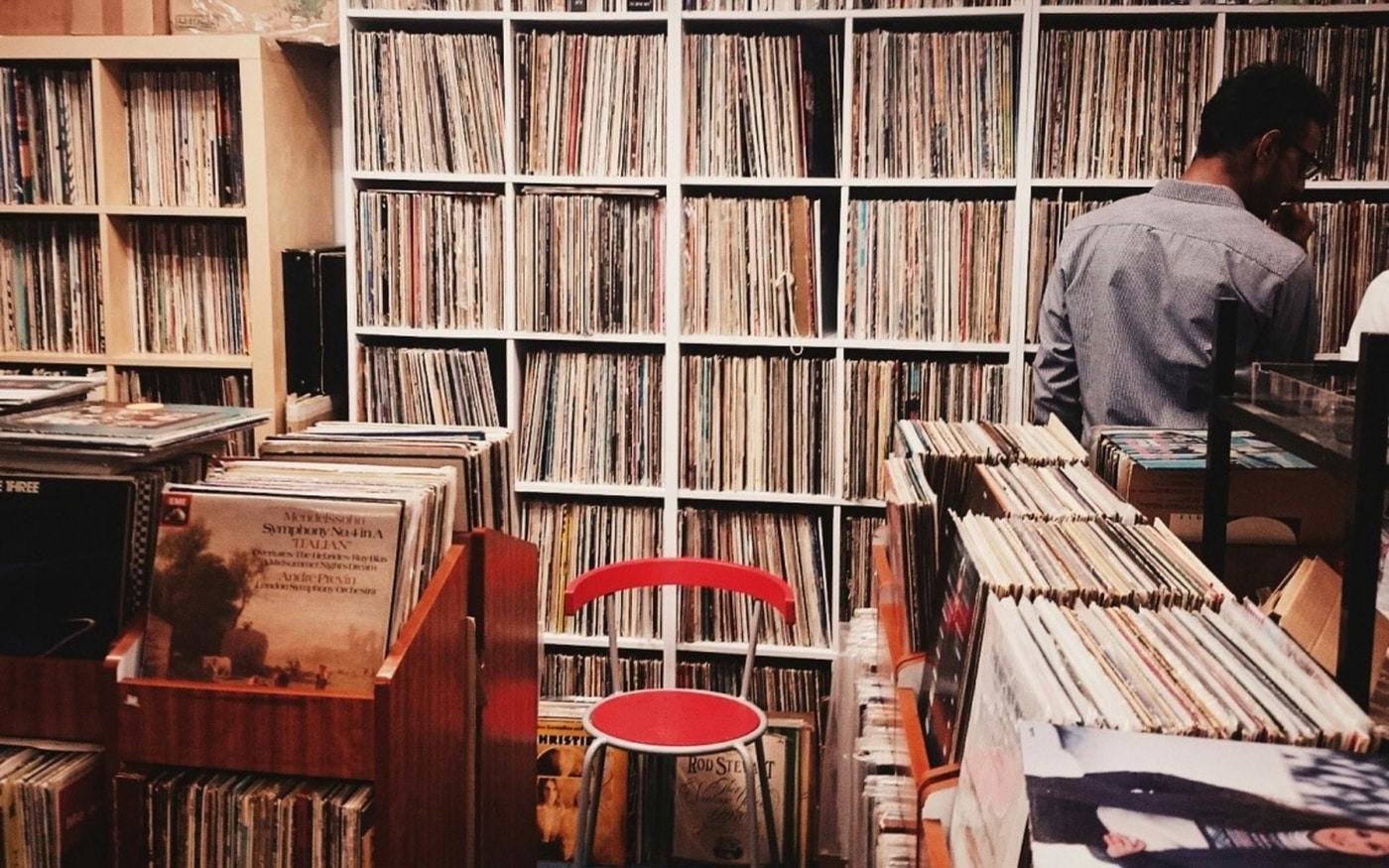 Vintage vinyl record shop in Portugal with shelves full of albums, a nostalgic spot for music lovers and collectors.