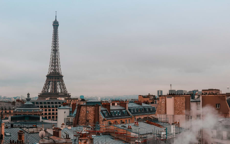 A panoramic view of the Paris skyline with the Eiffel Tower