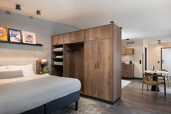 One Bedroom Open Plan Suite - Bed