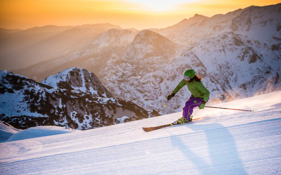 Skiers descending the snowy slopes of Semmering Ski Resort near Vienna