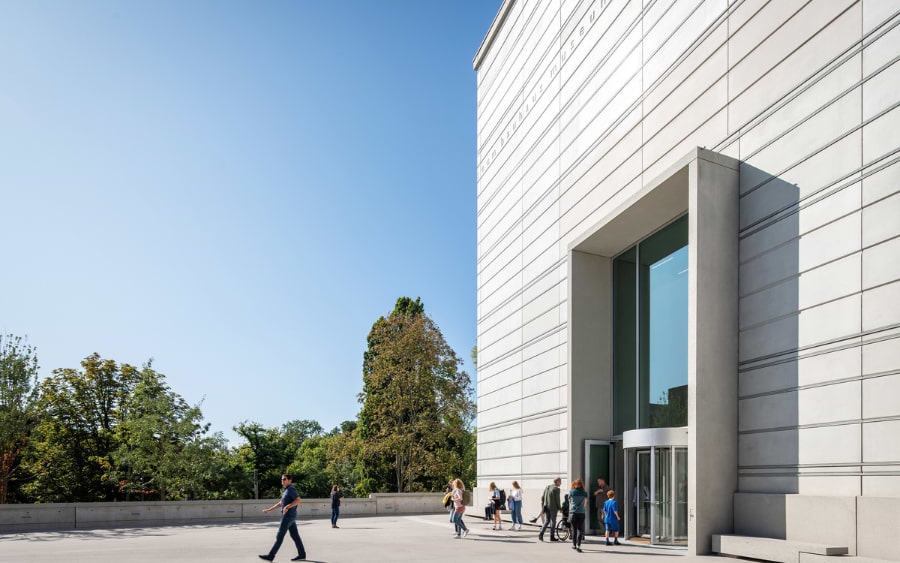 The modern exterior of the Bauhaus Museum in Weimar, featuring clean lines and contemporary design