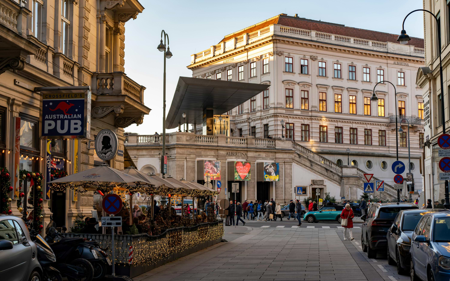 Albertina museum in Vienna with its modern Soravia Wing canopy and Monet to Picasso banners above the street