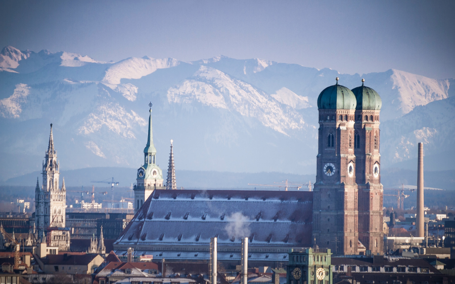 Panoramic view of the Munich historic center in winter with the mountains covered in snow