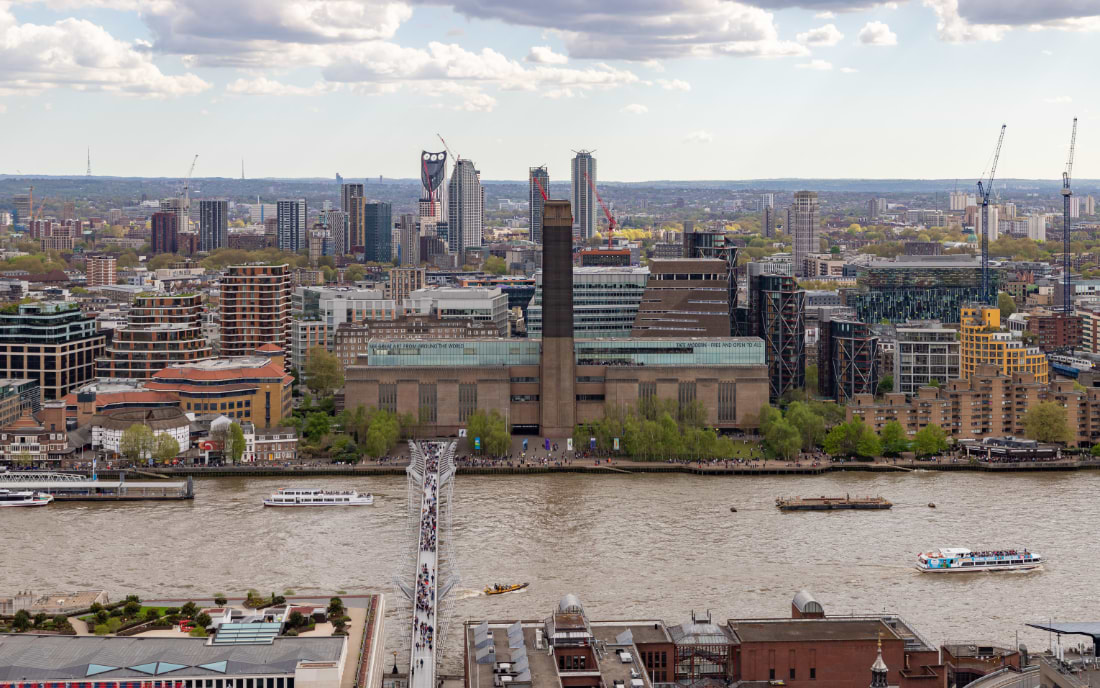Aerial view of Tate Modern on the South Bank of the River Thames in London, with the iconic chimney stack of the former power station
