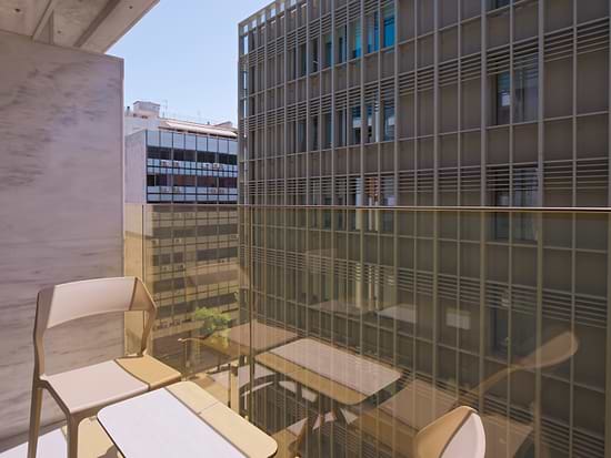 Private balcony and city view from Superior Room at Leonardo Hotel Athens City Center