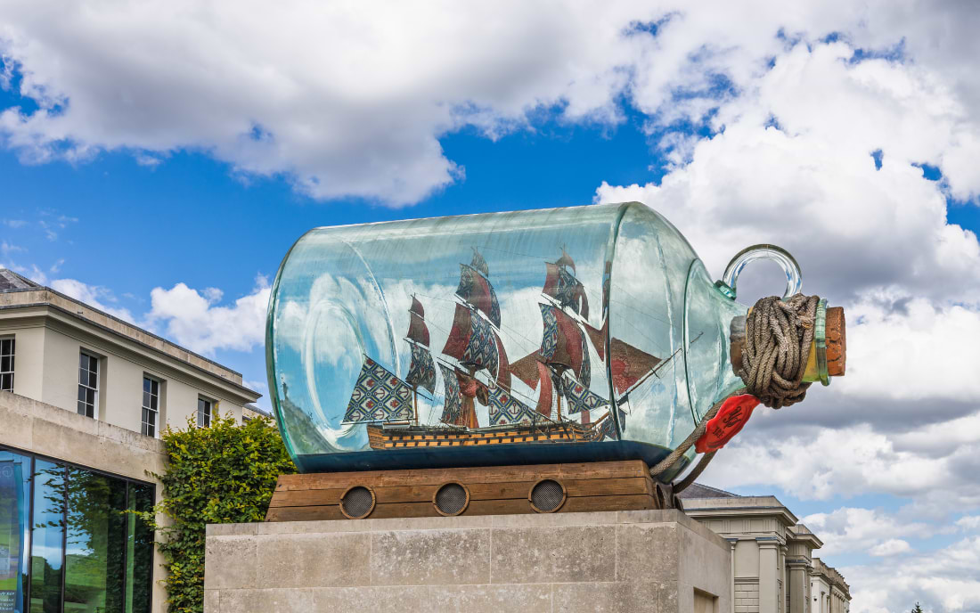 Yinka Shonibare's large-scale Nelson's Ship in a Bottle sculpture displayed outdoors at the National Maritime Museum in Greenwich, London