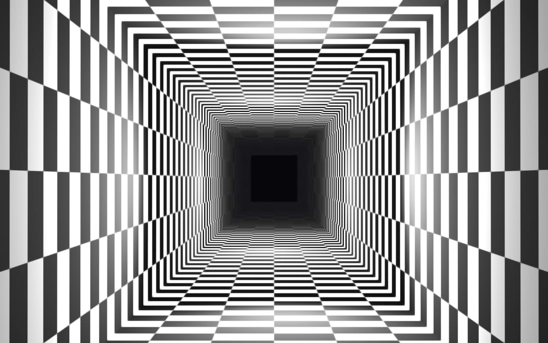 A black and white geometric optical illusion of an infinite tunnel