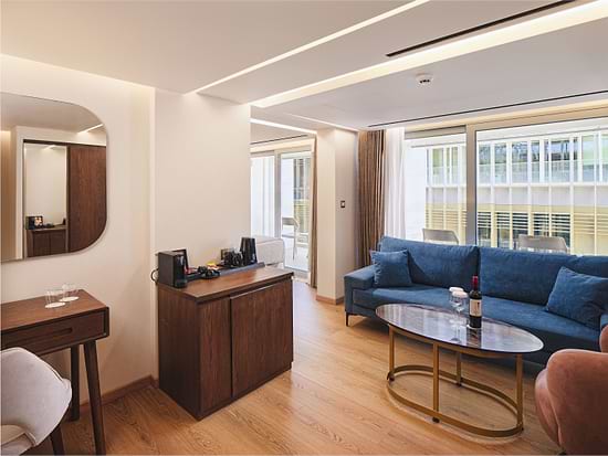 Living area of Junior Suite at Leonardo Hotel Athens City Center
