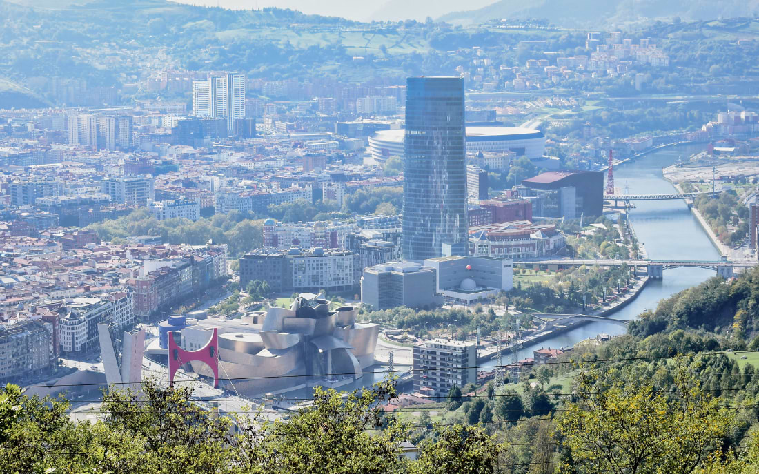 Panoramic view over Bilbao from the Artxanda hill with the Guggenheim Museum and Nervión River below