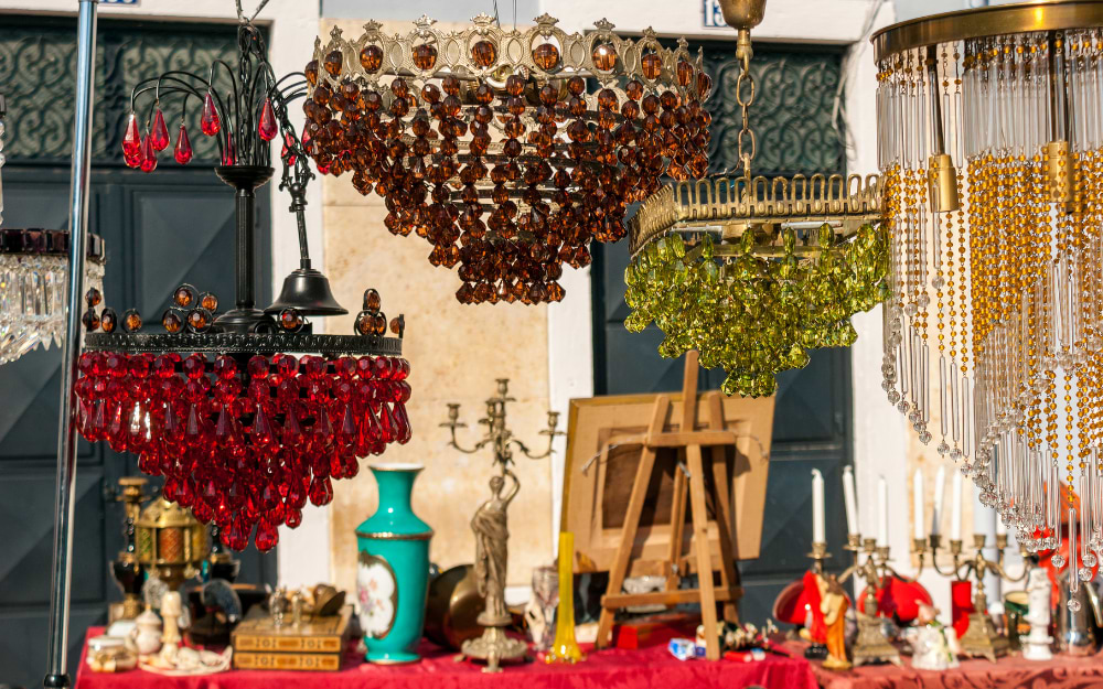 Stalls at the Feira da Ladra flea market, Campo de Santa Clara, Lisbon, Portugal.