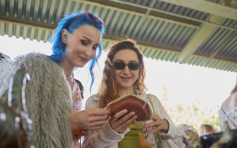 Wowen browsing trhough stalls of the Encants Flea Market, Barcelona