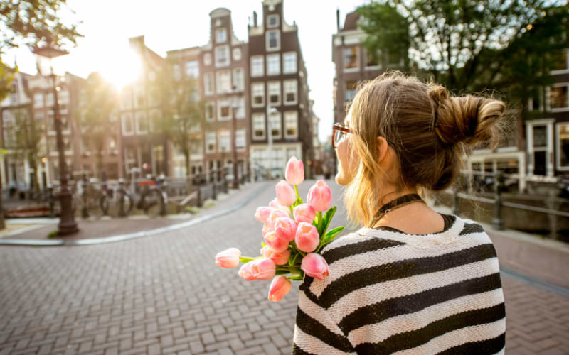 A tourist exploring the streets of Amsterdam