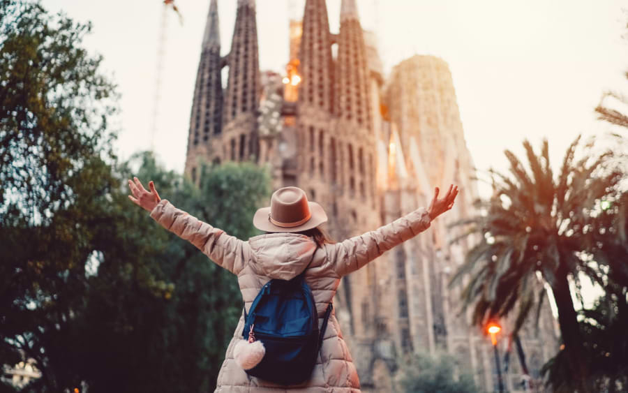 Woman enjoying her trip to Barcelona city center