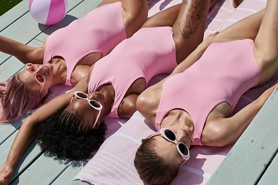 Three women on the rooftop pool at Leonardo Gordon Beach Tel Aviv Hotel