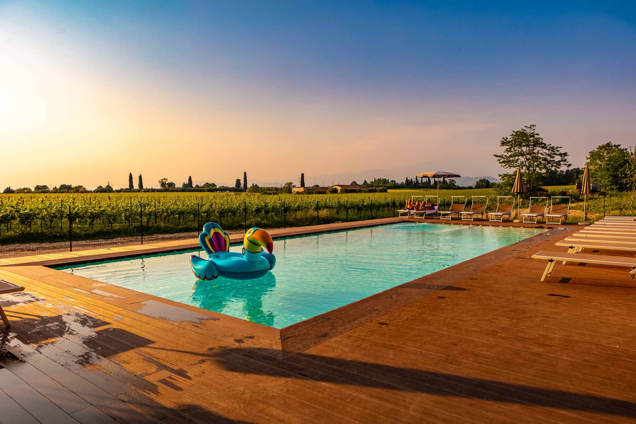 Sunset at the pool in Leonardo Hotel Lago di Garda Wellness & Spa, Italy