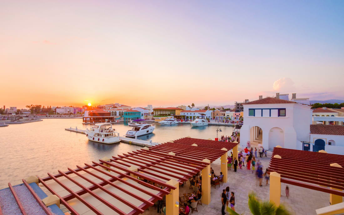 Limassol Marina at sunset with yachts and waterfront restaurants – perfect for nightlife in Limassol