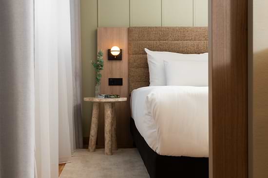 Deluxe One Bedroom with Single Sofabed - Bed