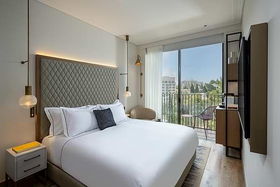 Nucha Hotel - Executive High Floor Room with Garden View and Balcony